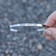 Load image into Gallery viewer, NOBODY FIGHTS ALONE Stamped Bracelet